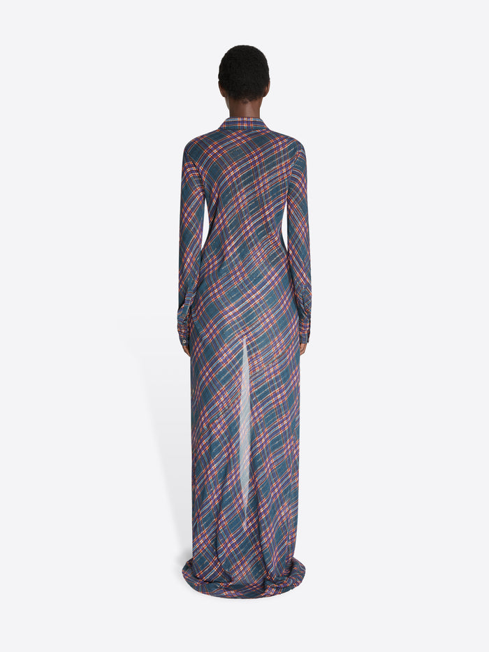 Back view of a model stands against a light gray background wearing a long-sleeve button-front shirt dress with a pink and blue plaid pattern.