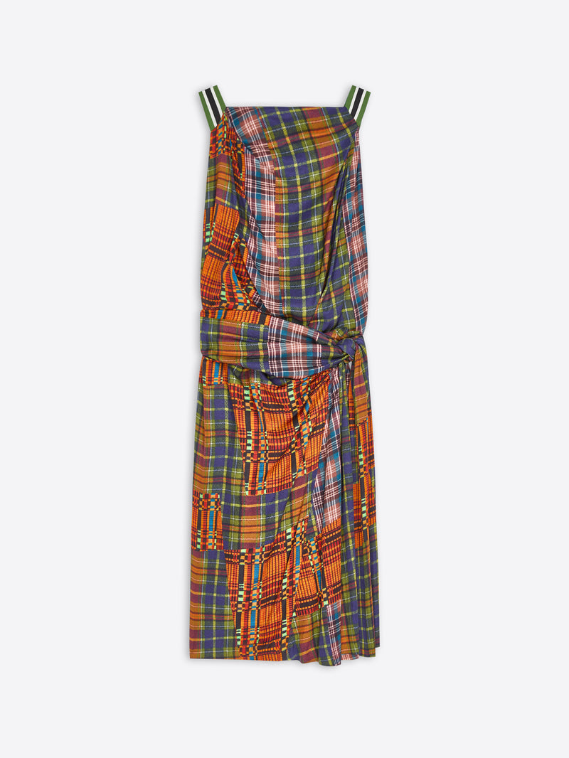 A sleeveless wrap dress with a multicolor plaid pattern, featuring shoulder straps and a self-tie waist, shown against a plain light gray background.