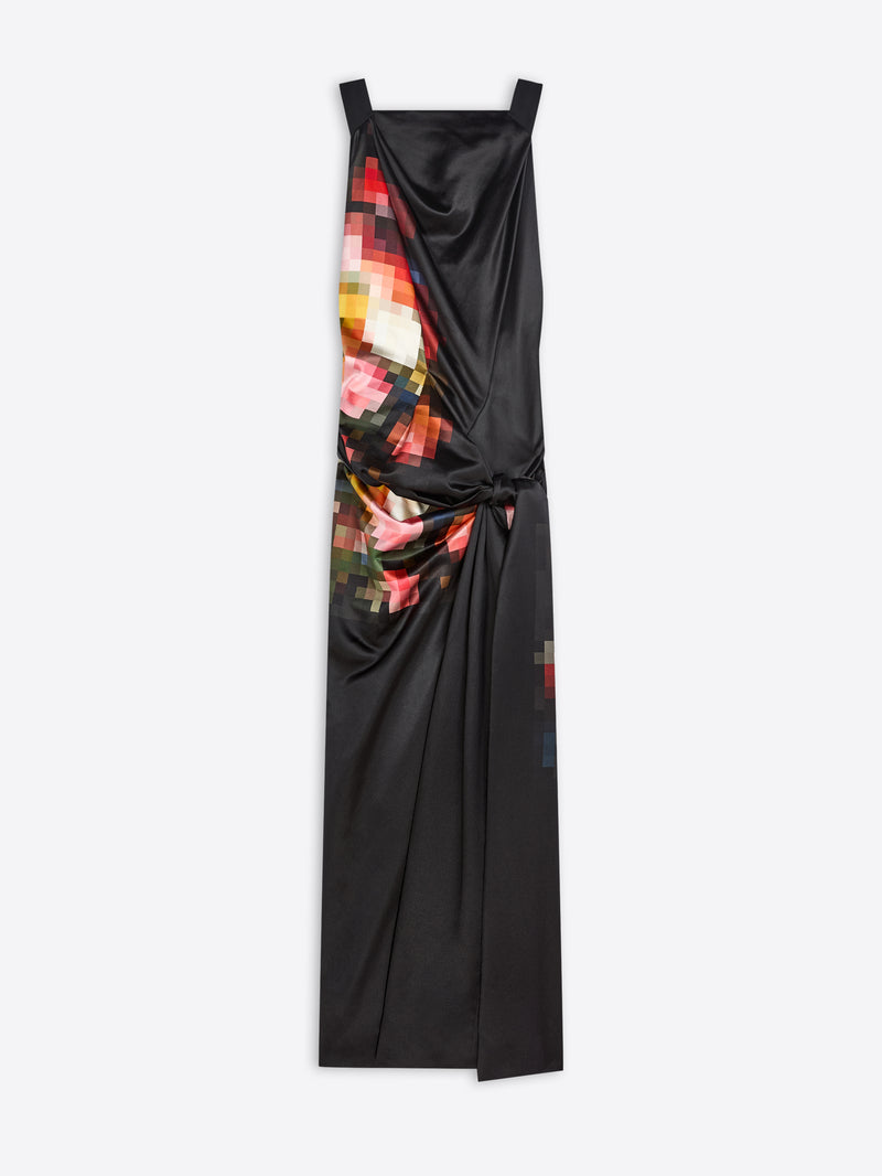 A black satin-like sleeveless dress with a dramatic draped wrap-style bodice and a colorful pixelated abstract print panel on the left side, shown against a light gray background.