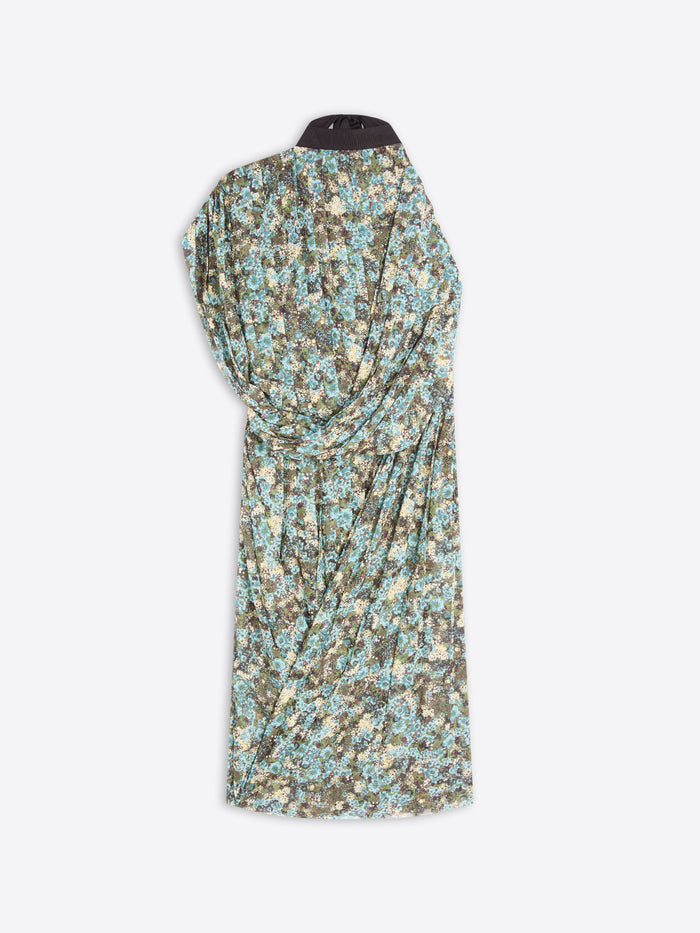 A sleeveless draped dress with a dense floral print in light blue, olive green, and beige displayed against a light gray background.