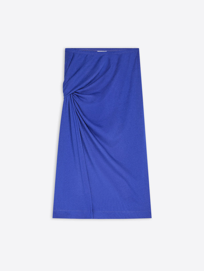 A royal blue wrap skirt with a gathered twist detail on the left side, displayed flat against a light gray background.