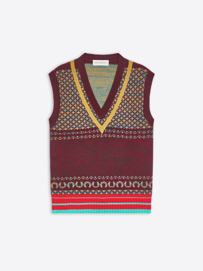 A sleeveless knit sweater vest with a V-neck, featuring a maroon base with geometric patterns and a striped border at the bottom.