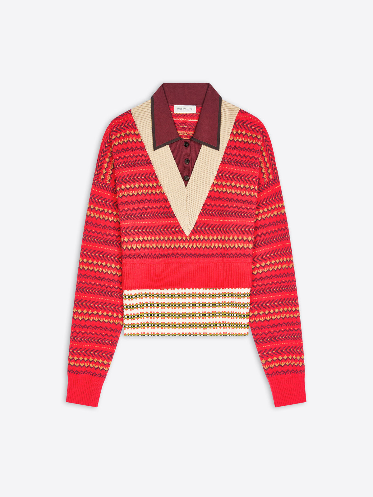 A cropped knit sweater with a geometric pattern, featuring a contrasting burgundy V-neck collar displayed on a light gray background.