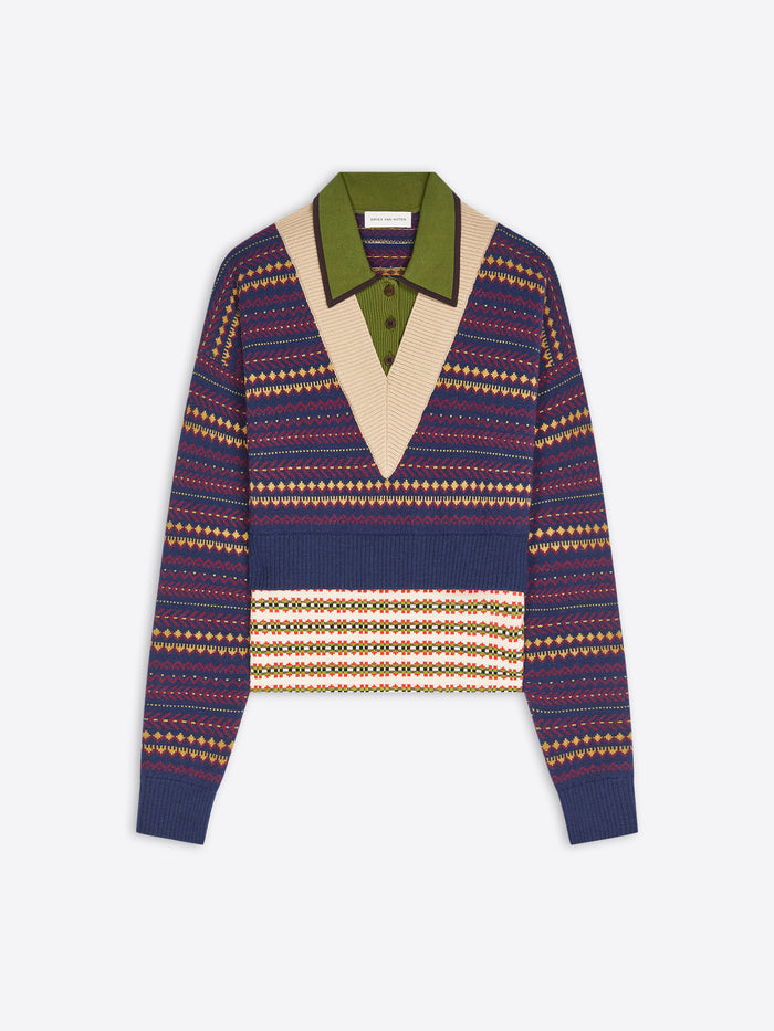 A cropped knit polo sweater featuring a navy blue base with geometric patterns, accented by a contrasting olive green collar.