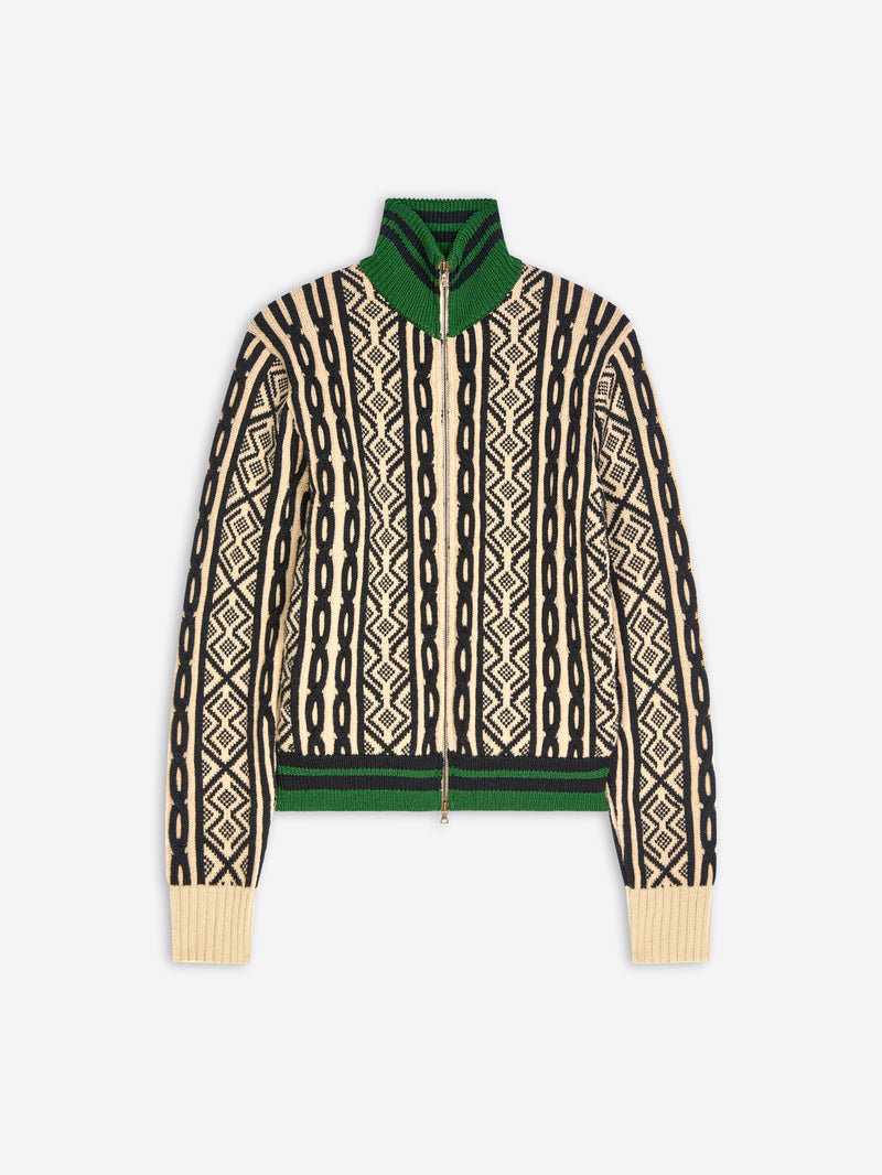 A cropped knit zip-up jacket featuring a cream and black geometric pattern, a solid green collar and hem, shown against a light gray background.