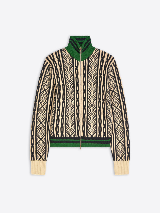 A cropped knit zip-up jacket featuring a cream and black geometric pattern, a solid green collar and hem, shown against a light gray background.