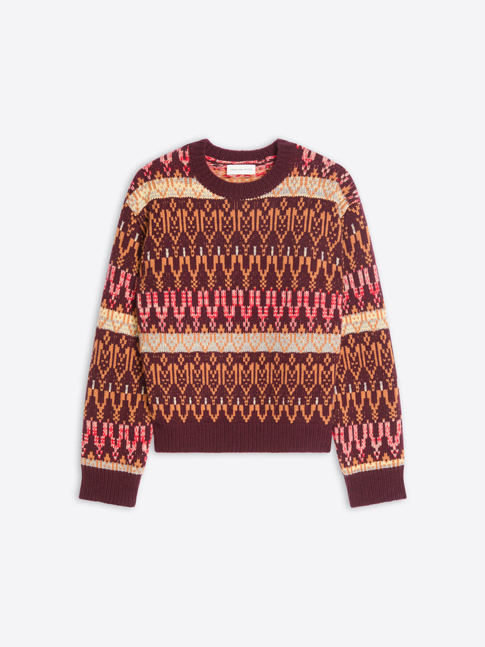 A long-sleeve crewneck knit sweater featuring a multicolor pattern displayed against a light gray background.