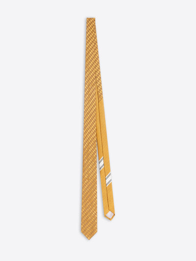 A tie in a mustard color, featuring a fine diagonal textured pattern on the main blade and two thin white diagonal stripes on the narrow tail, displayed against a light gray background.