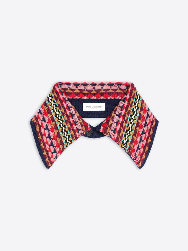 A knit collar with a colorful geometric pattern on a light gray background.