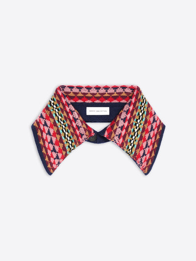 A knit collar with a colorful geometric pattern on a light gray background.