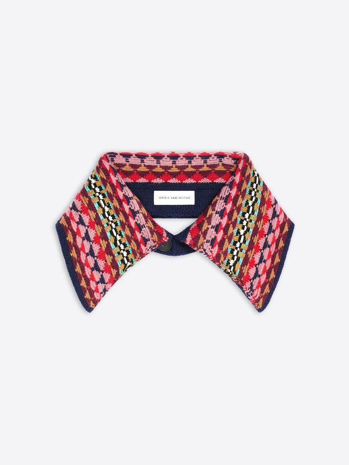 A knit collar with a colorful geometric pattern on a light gray background.
