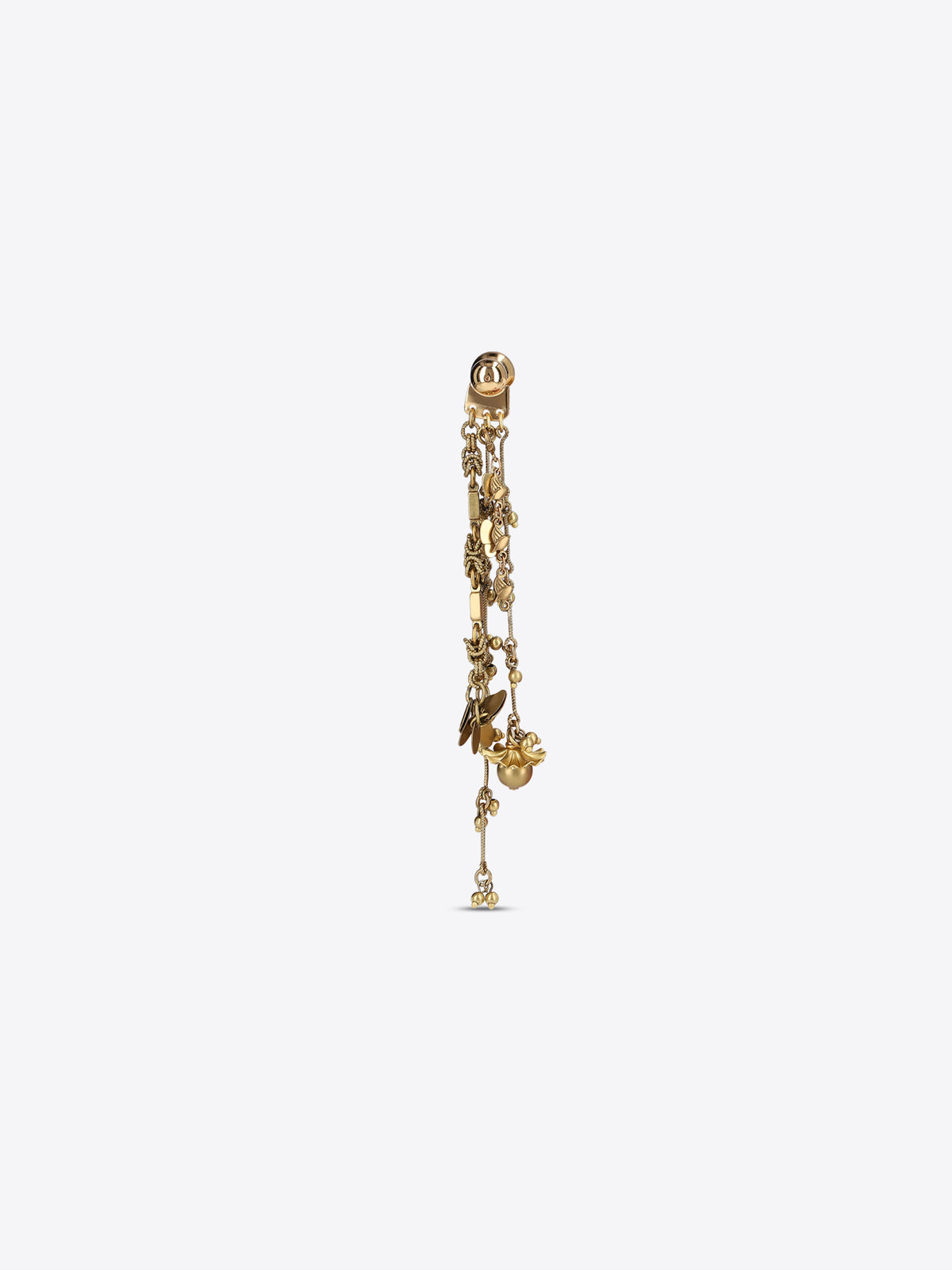 Single old brass drop earring with cascading chains, floral details, and dangling charms on a light gray background.