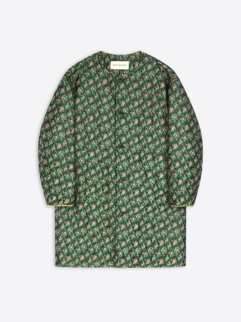 Green floral patterned coat on a white background