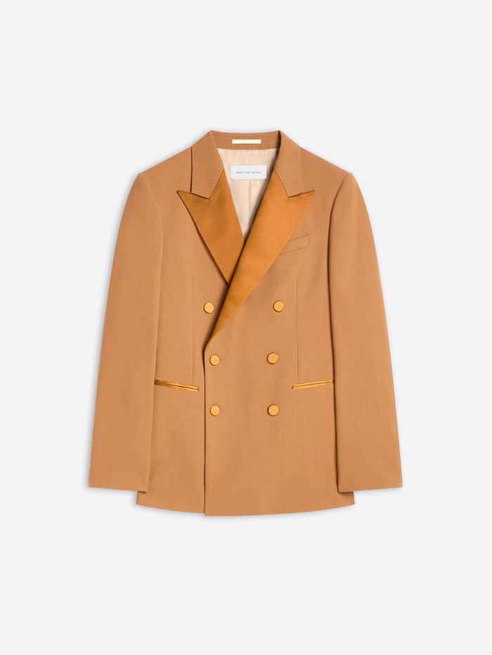 Orange blazer with buttons on a white background