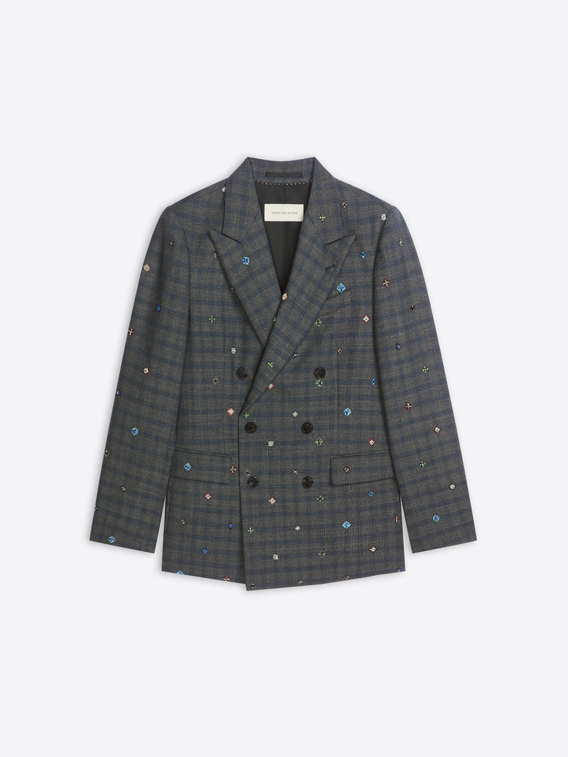 Plaid blazer with colorful embellishments on a white background