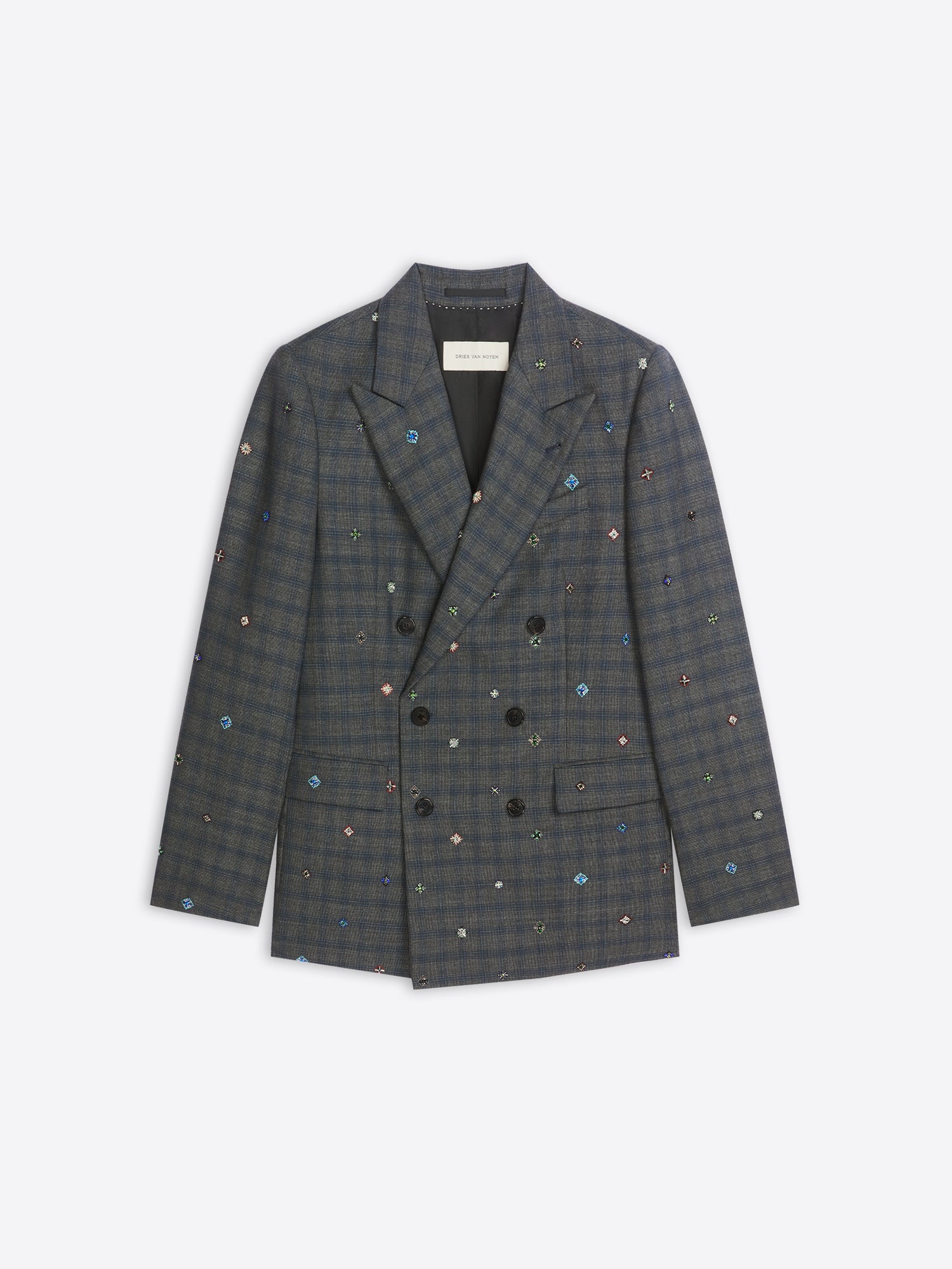 Plaid blazer with colorful embellishments on a white background