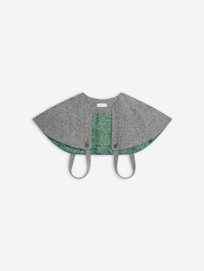 Gray cape-style garment on a white background