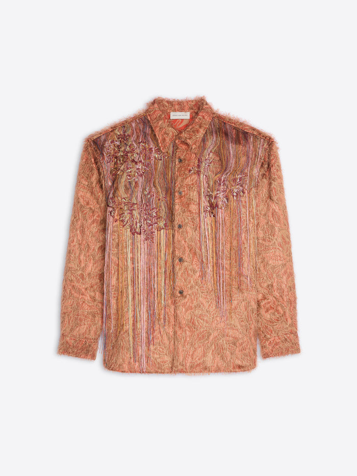 Patterned button-up shirt with embroidered floral detailing and long fringe accents across the chest on a white background
