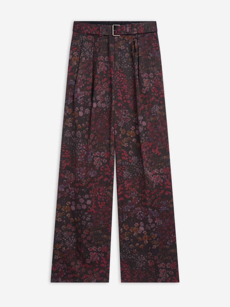 Floral patterned pants with a belt on a white background