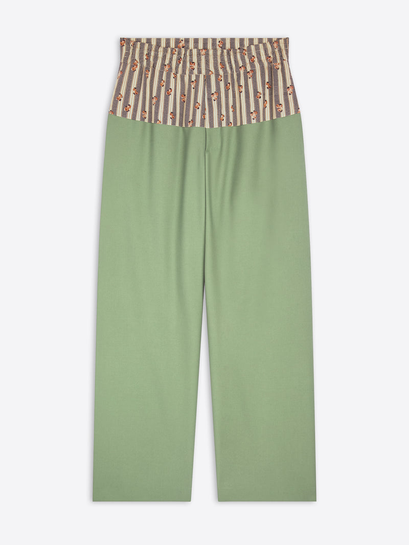 Green pants with a striped top section on a white background