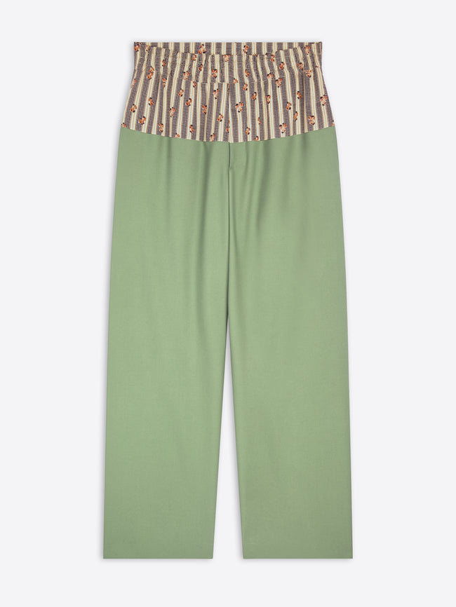 Green pants with a striped top section on a white background