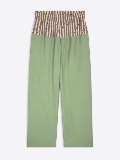 Green pants with a striped top section on a white background