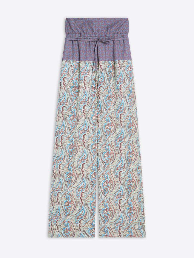 Patterned pants with a purple waistband on a white background