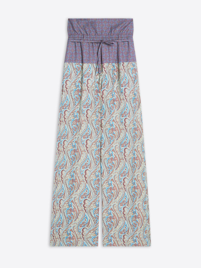 Patterned pants with a purple waistband on a white background