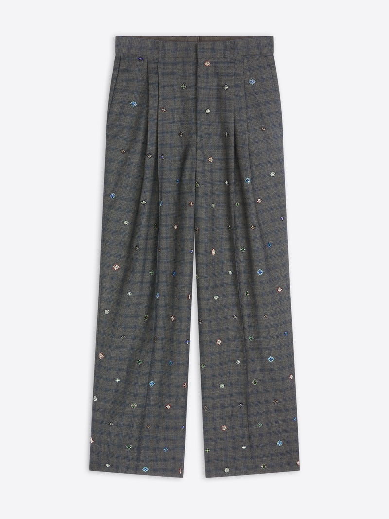Dark gray plaid pants with small colorful patterns on a white background