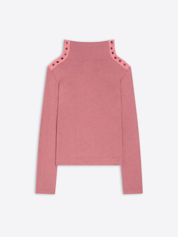 Pink turtleneck tee with cut-out shoulder details on a white background