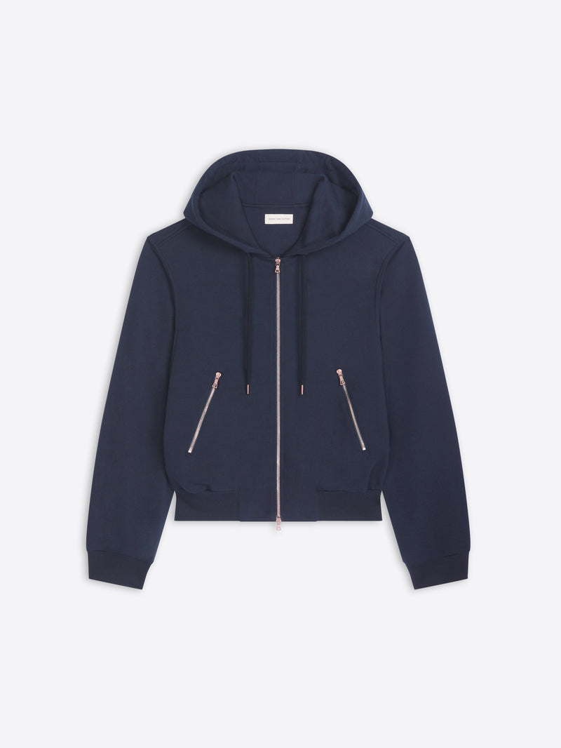 Navy blue hoodie with zippers on a light gray background