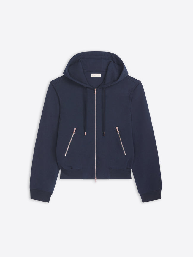 Navy blue hoodie with zippers on a light gray background