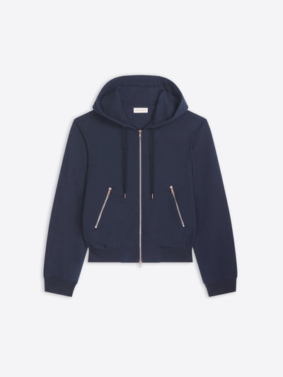 Navy blue hoodie with zippers on a light gray background