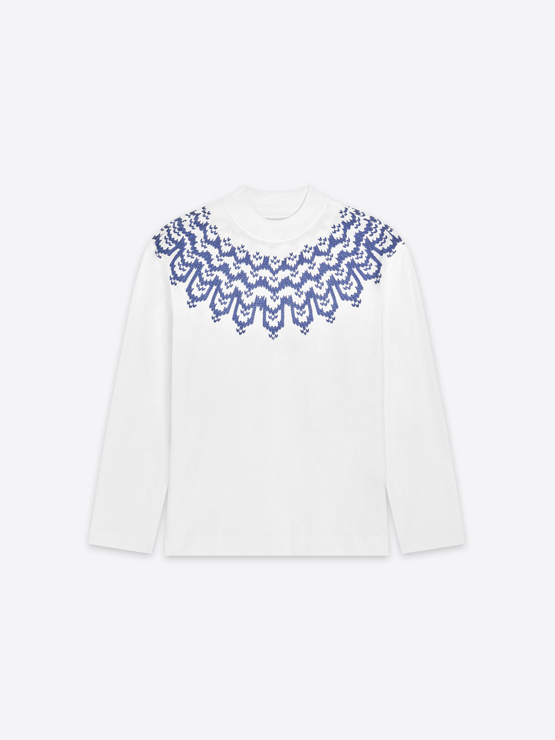 White long sleeve with blue lace detailing on a white background