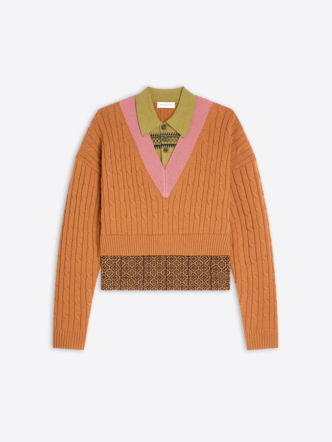 Orange sweater with patterned band and collar on a white background