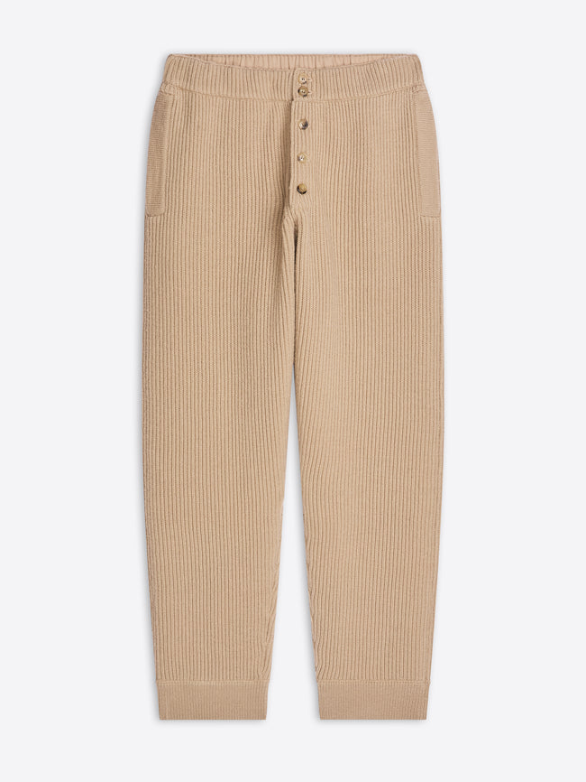 Beige ribbed pants on a white background