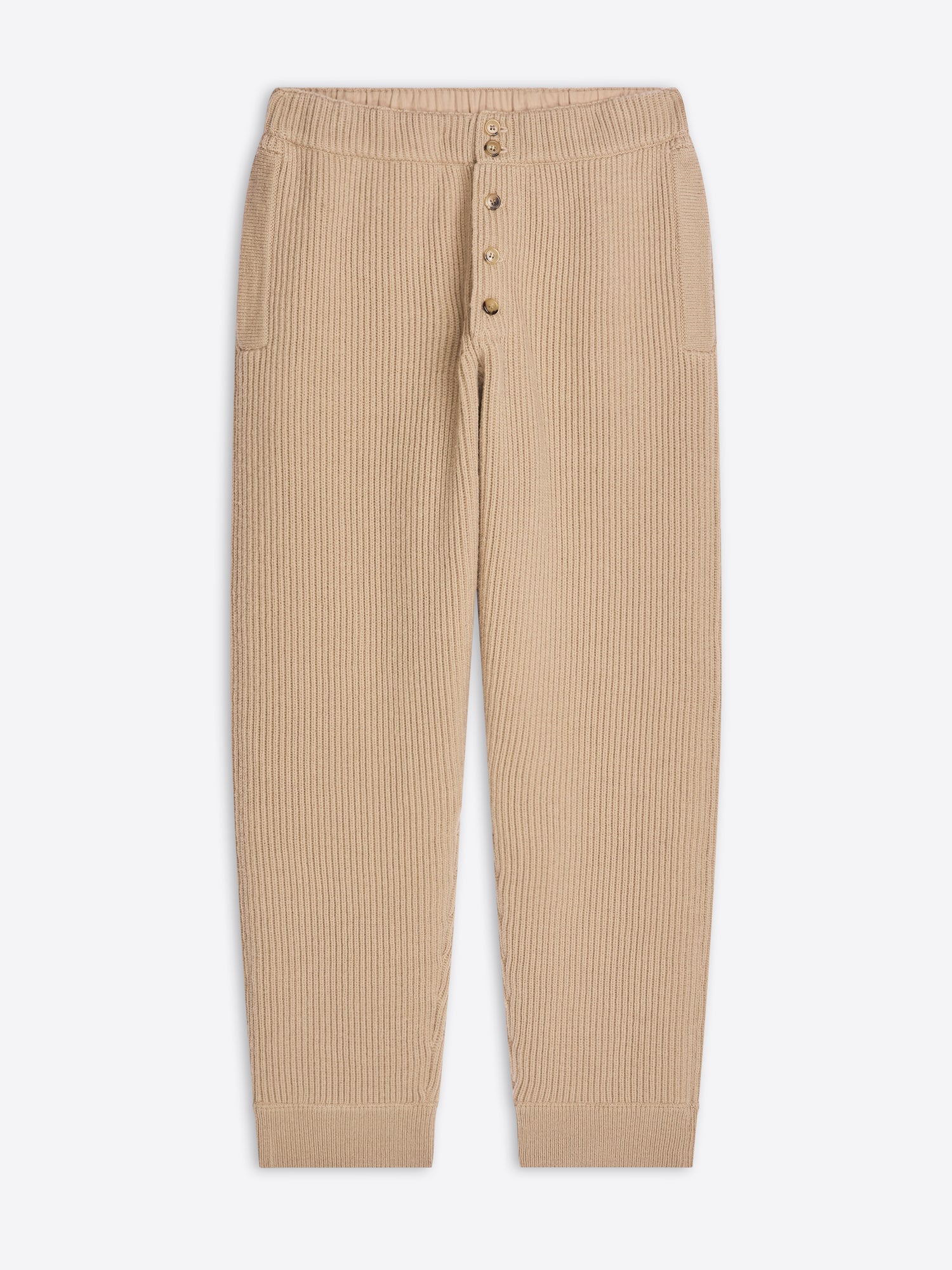 Beige ribbed pants on a white background