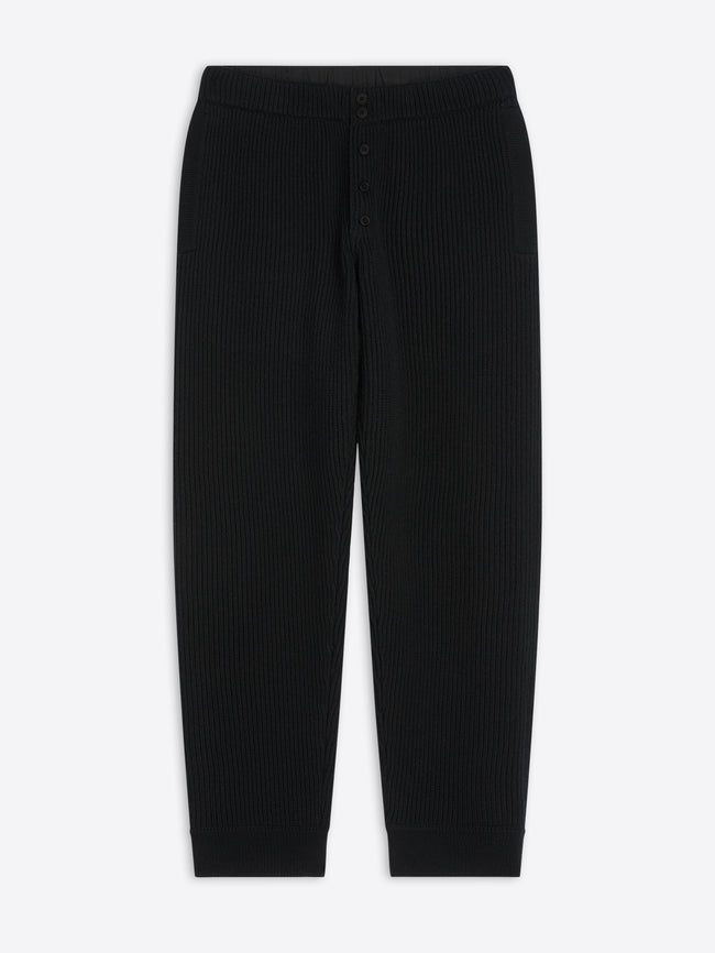 Black ribbed pants on a white background