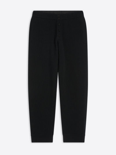 Black ribbed pants on a white background