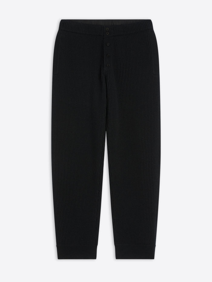 Black ribbed pants on a white background