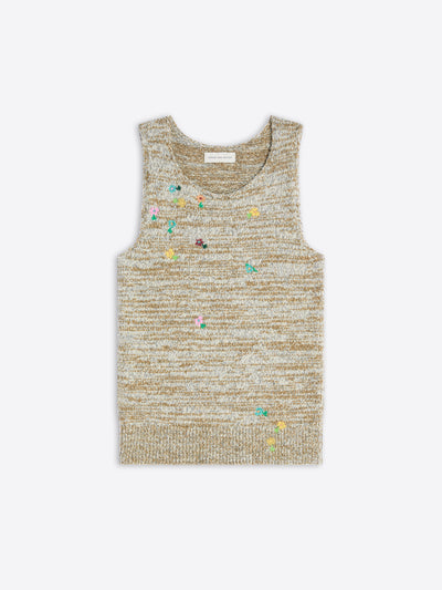 Textured tank top with floral embellishments on a light background