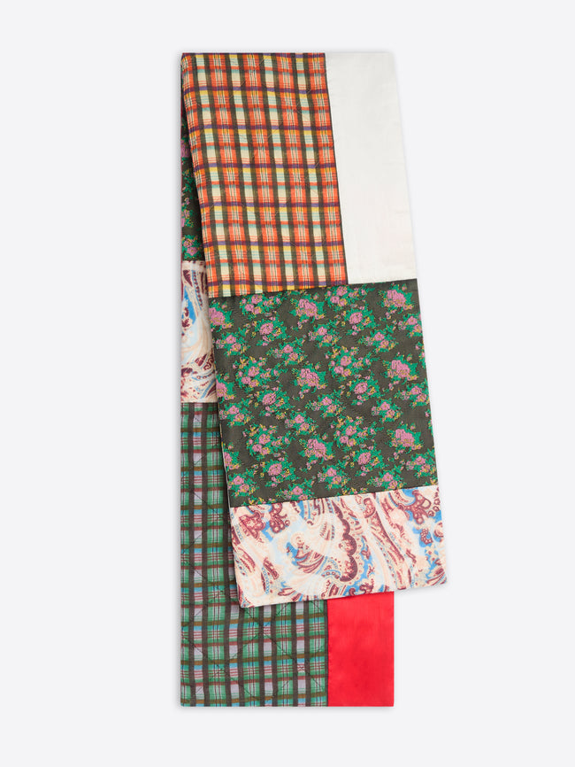 Scarf with patchwork pattern of various colors and patterns on a white background