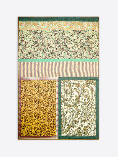 Multicolored patterned pareo with geometric and paisley designs on a white background