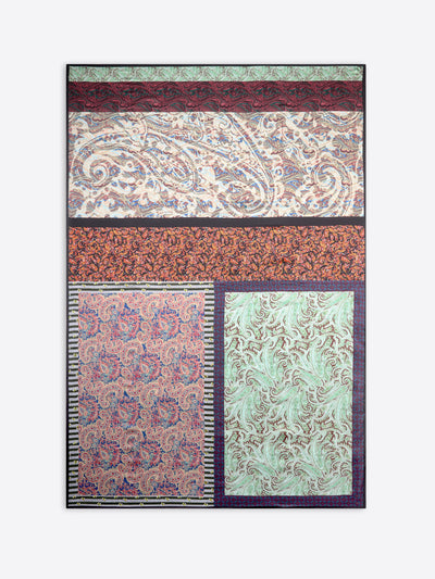 Multicolored patterned pareo with geometric and paisley designs on a white background