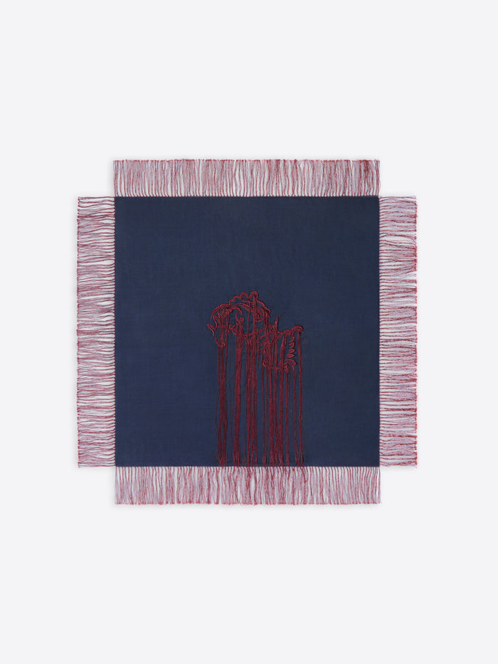 Navy scarf with red fringe design on a white background