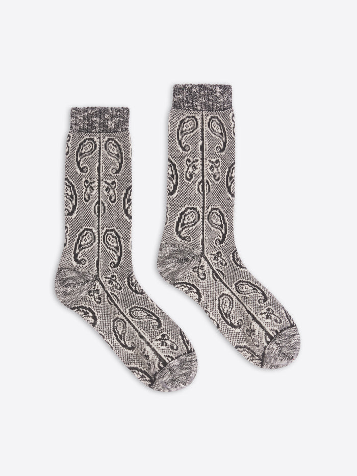 Pair of gray patterned socks on a white background