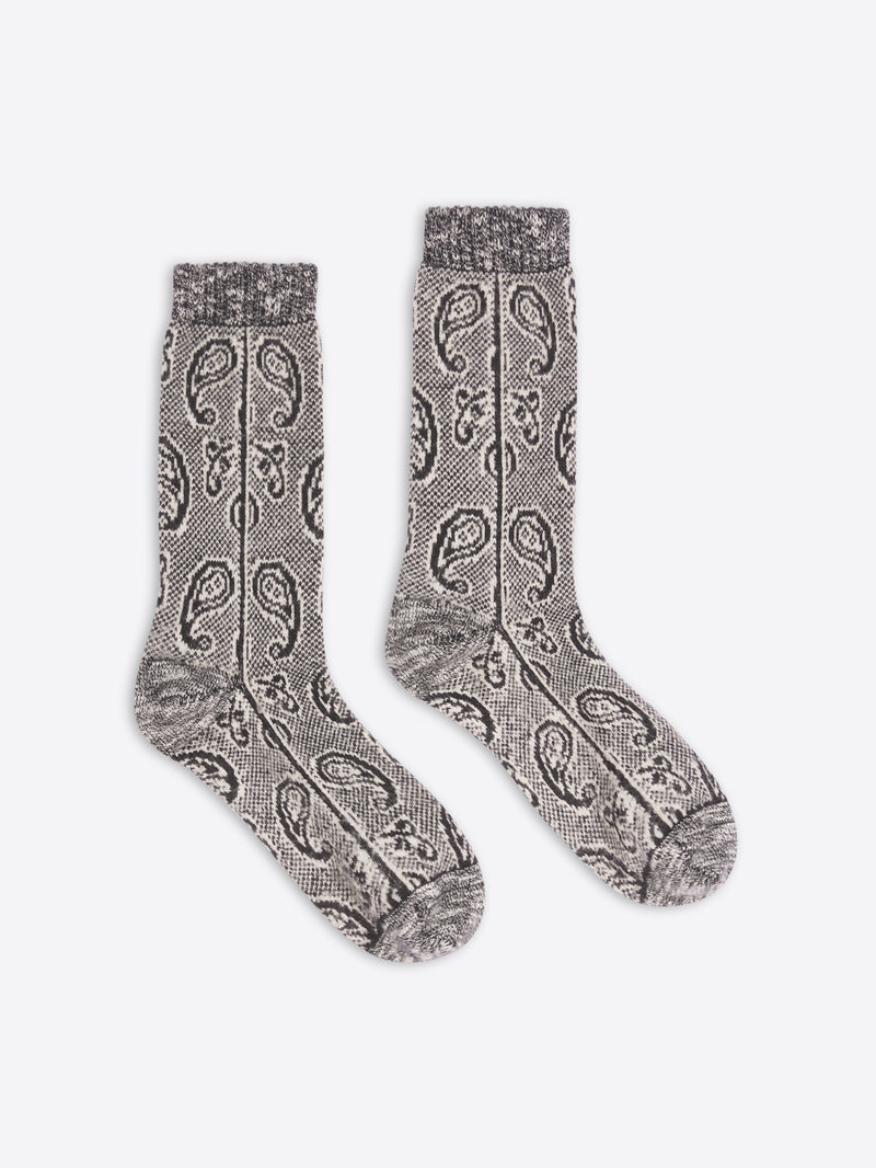Pair of gray patterned socks on a white background