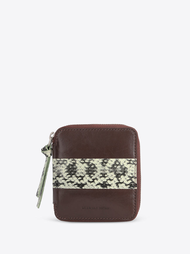 A small brown leather zip-around wallet with a horizontal black and beige snakeskin pattern stripe across the front, shown on a light gray background.