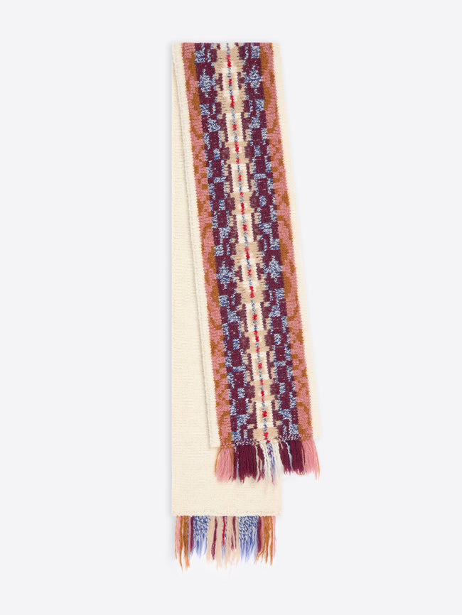 Colorful patterned scarf with fringes on a white background