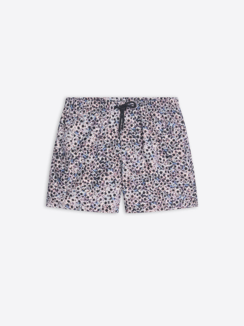 Floral patterned swim shorts on a white background
